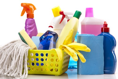 Olivia Cleaning Solutions team cleaning hardwood floors