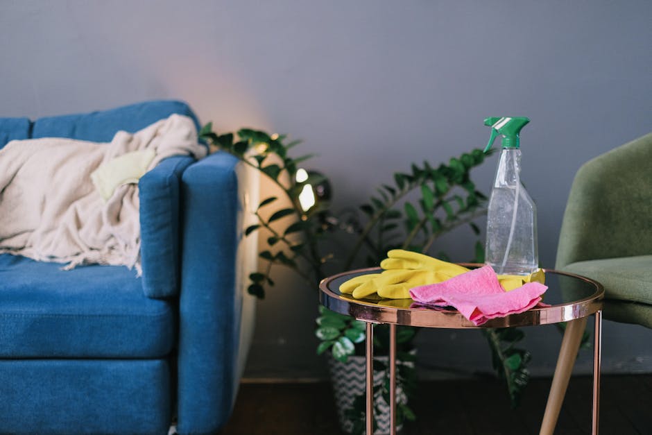 A professional cleaner from Olivia Cleaning Solutions is conducting a thorough inspection of a rental property's interior, reviewing a detailed home inspection checklist on a clipboard. The inspector,